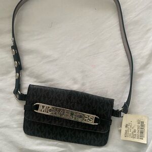 Michael Kors waist bag 4x6.5 size medium 36 inches.